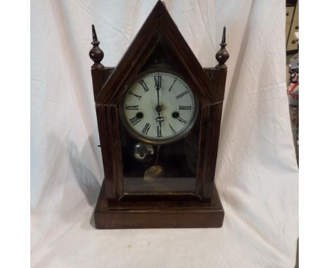 Oak cased mantle clock with key. Not available for in-house P&amp;P 
