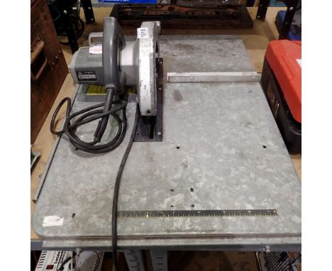 Circular saw fitted to tabletop. Not available for in-house P&amp;P 