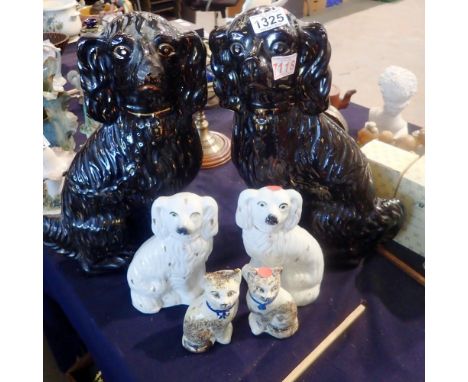 Two pairs of ceramic spaniels and a pair of cats, some damages. Not available for in-house P&amp;P