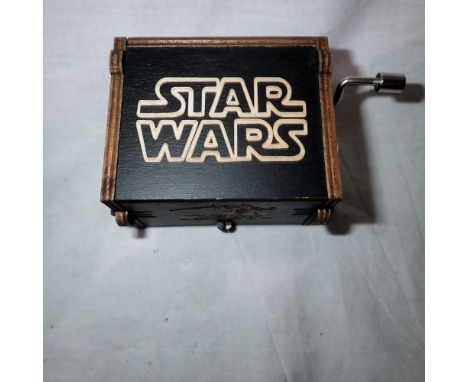 Star Wars theme tune, crank musical box. UK P&amp;P Group 1 (£16+VAT for the first lot and £2+VAT for subsequent lots)
