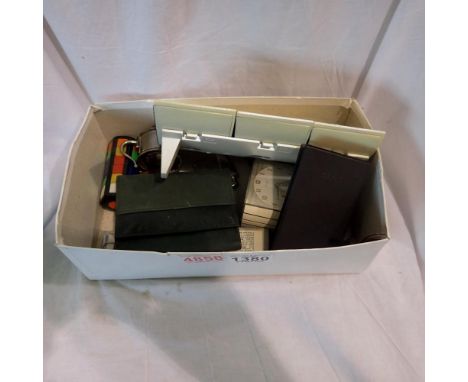 Box of assorted items, including a German alarm clock and watches. Not available for in-house P&amp;P