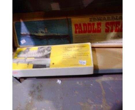 Assembly ladder for ship models by Aeropiccola, a boxed paddle steamer kit and a further boxed item. Not available for in-hou