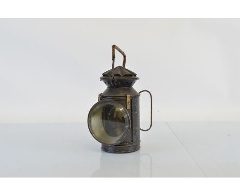 An early 20th century railway lamp, 29cm high.