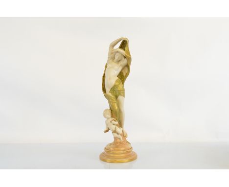 A Royal Worcester porcelain figurine, femme fatale emerging from a cupid and it's cloud, with gilt and green drape, on oval s