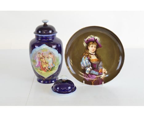 A continental porcelain hand painted cabinet plate, depicting portrait of young girl in period costume with purple and feathe