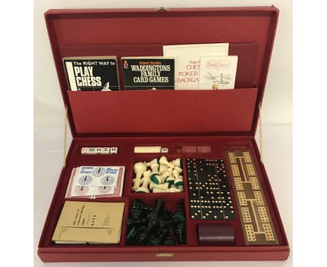 A complete vintage Waddington's Games Compendium for adults.To include: instruction books, card games, chess pieces, Poker di