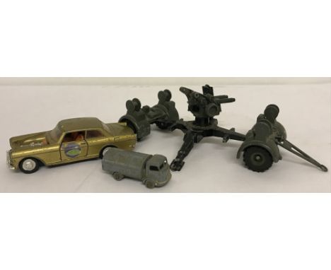 3 vintage diecast vehicles, in play worn condition. Comprising: Dinky Toys 88mm gun, Lesney No 38 Karrier Refuse Collector an