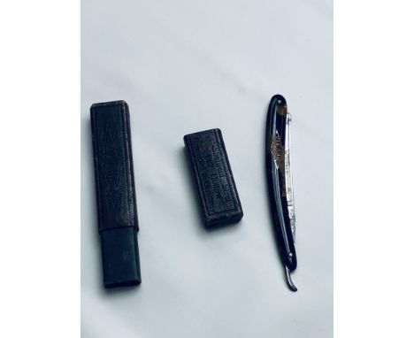 Tortoise shell handle cut throat razor