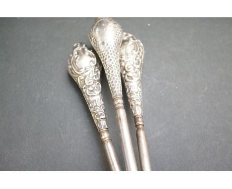 3 Victorian silver handled button hooks 