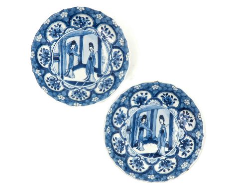 Scalloped edge, depicting 2 Chinese ladies with one holding a fan, Chenghua mark, Kangxi Period, 15 cm. in diameter, hairline