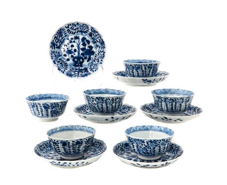 Depicting scene in garden with flowers and rocks, Kangxi mark, saucers are 12 cm. in diameter.
