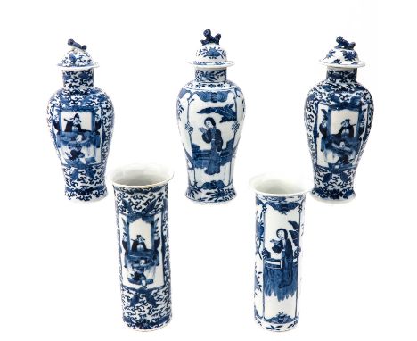 Scrolling floral ground with cartouches of Chinese figures, Kangxi mark, tallest vase is 21 cm., in diverse conditions.