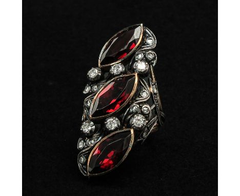 14KG set with 3 large garnets and diamonds ring size 17