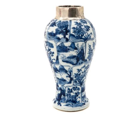 Depicting scenes with Chinese figures, flowers, and landscapes, Kangxi Period, with silver rim, 23 cm. tall. 