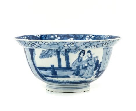 Decorated with underglaze blue with Chinese figures in garden scenes, Kangxi Mark and Period, 16 cm. in diameter, 2 holes on 