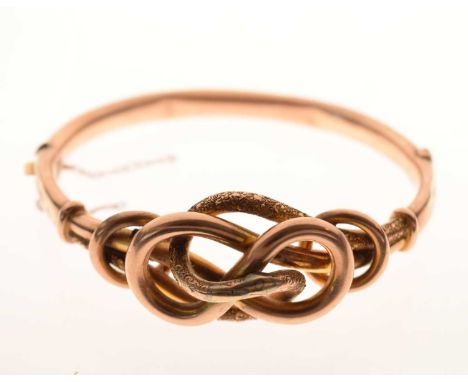 Knotwork hollow snap bangle, tagged '9c', 12.7g approx