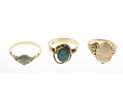 Three various rings, including a 9ct gold cameo ring, an opal-doublet ring stamped '9ct', and an unmarked dress ring, 8.3g gr