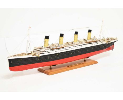 Large balsa wood scale model of White Star Line's RMS Titanic, well detailed with bridge details, lifeboats, railings and mas