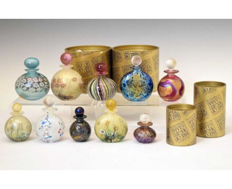 Isle of Wight Glass - Collection of ten perfume bottles, eight of spherical and two of compressed form each with globe stoppe