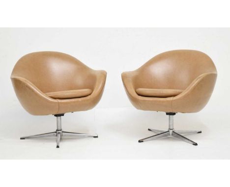 Pair of mid-century brown leatherette swivel armchairs, each raised on tri-form bases, 47.5cm (seat diameter) 