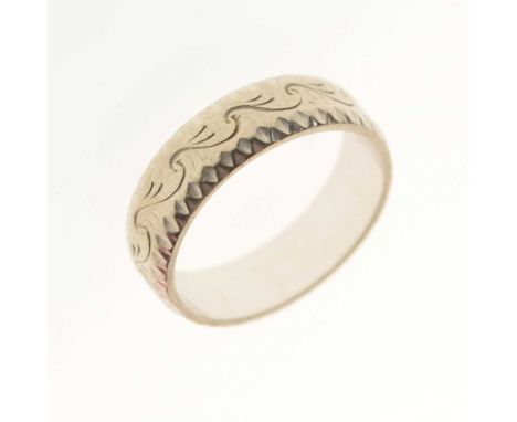 18ct white gold wedding band having engraved decoration, size K approx, 4.3g approx
