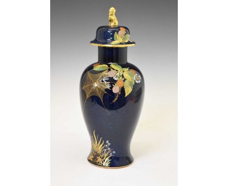 Carlton Ware vase and cover, of baluster form, painted and gilded in the 'Spider's Web' pattern on a deep blue mottled ground