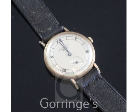 A gentleman's late 1920's 9ct gold J.W. Benson manual wind wrist watch, with Roman and baton numerals and subsidiary seconds,