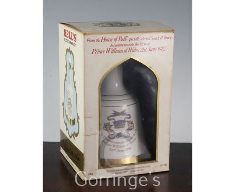 A boxed Bells scotch whisky, Birth of Prince William of Wales 1982 commemorative flask and contents, 20.5cm