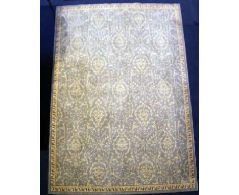 A Chinese rug,with damask scroll decoration, on a pale blue ground,7ft 5in. by 5ft 3in.