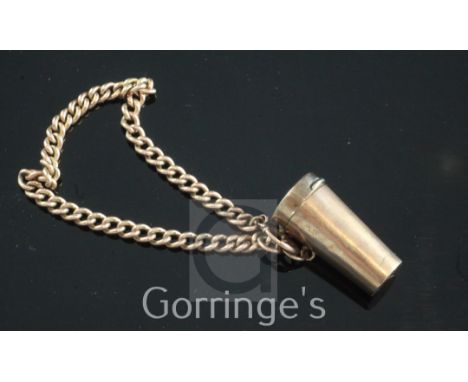 An early 20th century 9ct gold cased telescopic cigarette holder, on a 9ct gold chain, with amberoid mouthpiece (a.f.) case 1