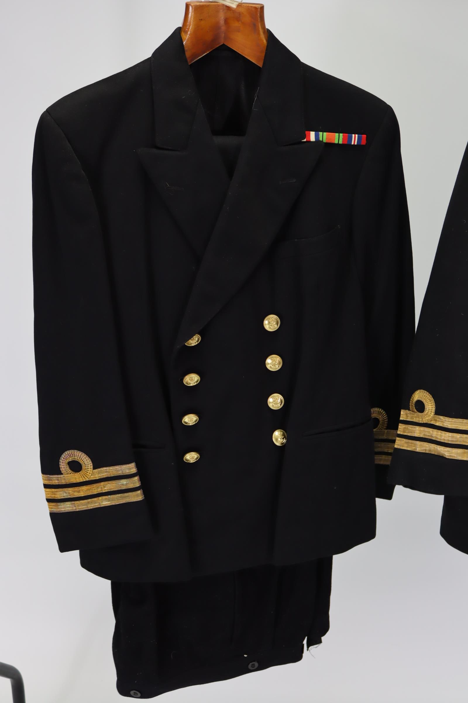 Four WWII British Navy Captain’s dress uniforms.