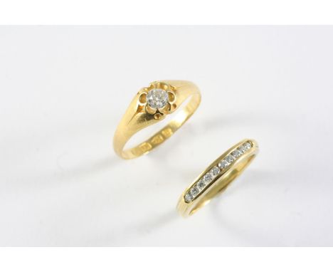 A DIAMOND SOLITAIRE RING mounted with a cushion-shaped diamond, in 18ct yellow gold, 2.1 grams, size O 1/2,  and a diamond ha