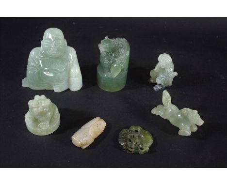 CHINESE JADE &amp; JADEITE CARVINGS a mixed lot including a pale celadon and russet pendant in the form of a locust, with two