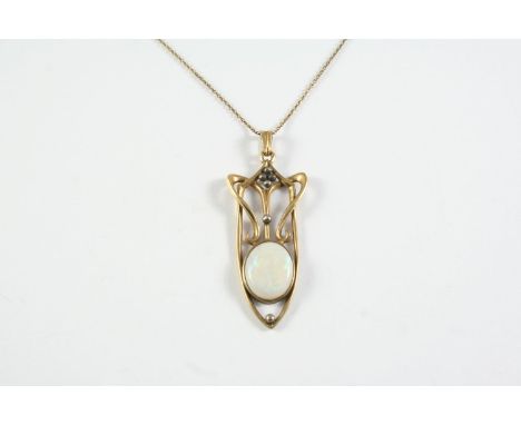 AN OPAL AND GOLD PENDANT the oval-shaped white opal is set within a 9ct gold openwork mount, 4.5cm long including pendant bal