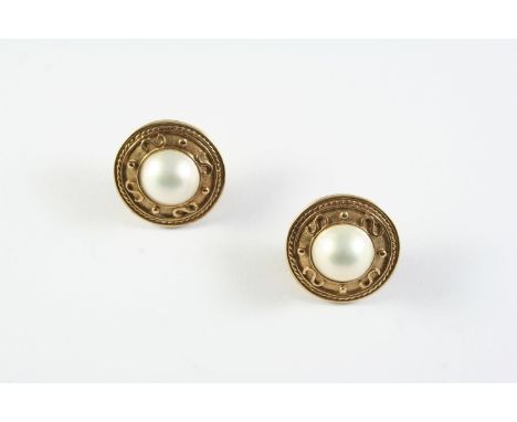 A PAIR OF CULTURED PEARL AND GOLD EARRINGS each earring set with a half pearl within a 9ct gold mount with embossed rope and 