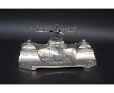 WMF - AEROPLANE INKWELL a silver plated model of a Rumpler 'Taube' (Dove) Aeroplane, mounted on an inkstand with two glass in