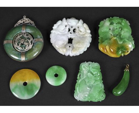 CHINESE JADE &amp; JADEITE CARVINGS including a large circular pendent with metal discs to each side and pendent attachment, 