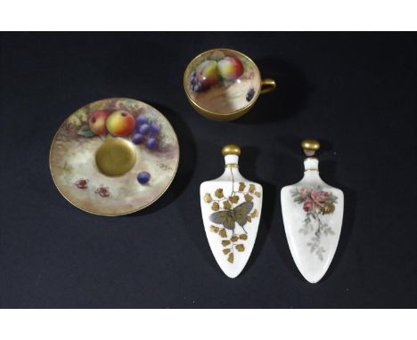 ROYAL WORCESTER SCENT BOTTLES one painted with a Butterfly and foliage, the other painted with flowers and foliage, both of f