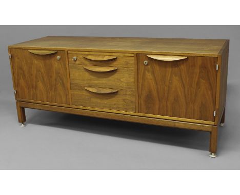 JENS RISOM MID CENTURY SIDEBOARD - DANISH a teak sideboard with three central drawers flanked by two cupboards, one cupboard 