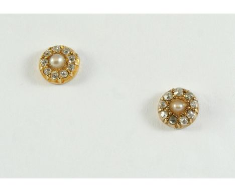 A PAIR OF DIAMOND AND PEARL CLUSTER STUD EARRINGS each earring centred with a half pearl within a surround of rose-cut diamon