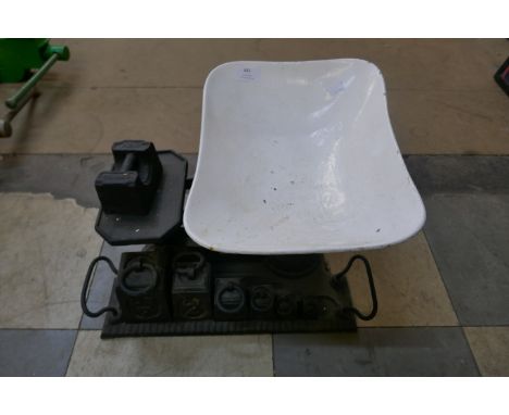 A set of vintage scales with weights 