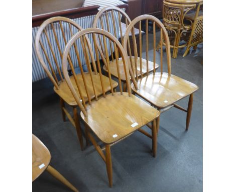 A set of four Ercol Blonde elm and beech Windsor chairs 