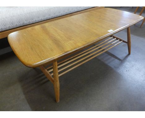 An Ercol Blonde elm and beech Windsor coffee table 