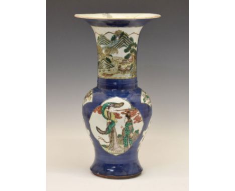 Large Chinese Famille Verte baluster shaped vase decorated with shaped reserves depicting landscapes, figures, antiques and f