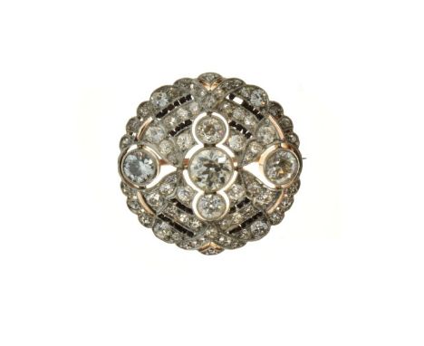 Edwardian diamond panel brooch, unmarked, the central stone of approximately 0.8 carats, with a diamond to either side of app