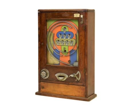 Mid 20th Century table-top 'penny-in-the-slot' arcade machine of bagatelle type in fruitwood case with hinged glazed door, 68