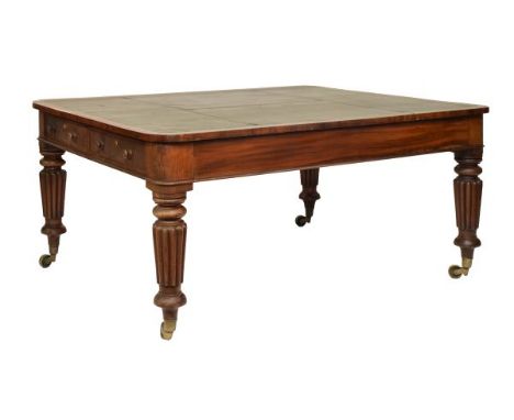 Mid 19th Century mahogany library table, the rounded oblong top with gilt-tooled green Morocco skiver within crossbanded bord