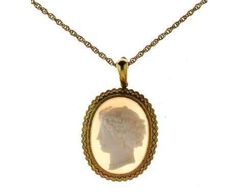 Victorian hardstone pendant, carved as a classical female in profile, the gold mount with black enamel decoration, 4.6cm x 3.
