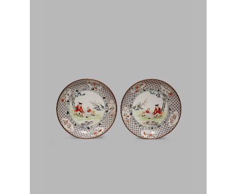 A PAIR OF CHINESE CANTON ENAMEL FAMILLE ROSE DISHES, 19TH CENTURY The centre painted with a European with his attendant sitti