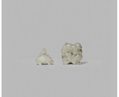 TWO SMALL CHINESE PALE CELADON JADE CARVINGS, QING DYNASTY One depicting a boy riding upon the back of a water buffalo, the o